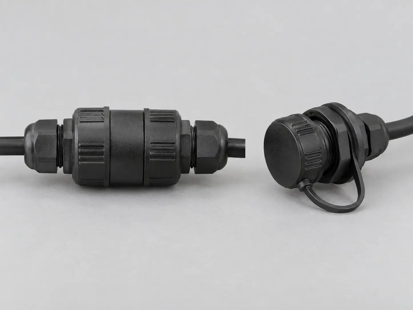 mated waterproof DC connector and capped unmated socket